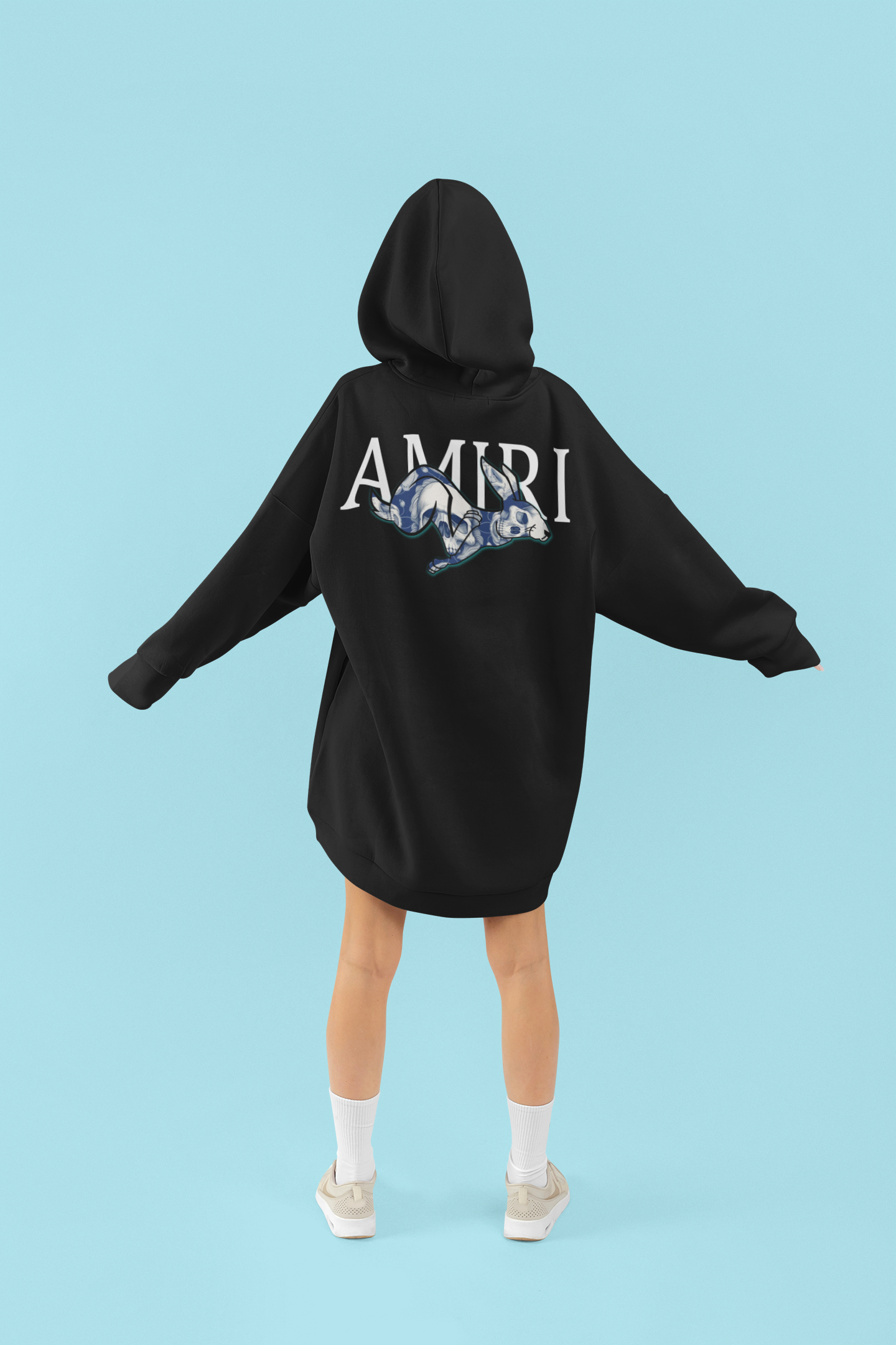 https://0901.nccdn.net/4_2/000/000/000/c80/back-view-featuring-a-woman-wearing-an-oversized-hoodie-amiri-go.png