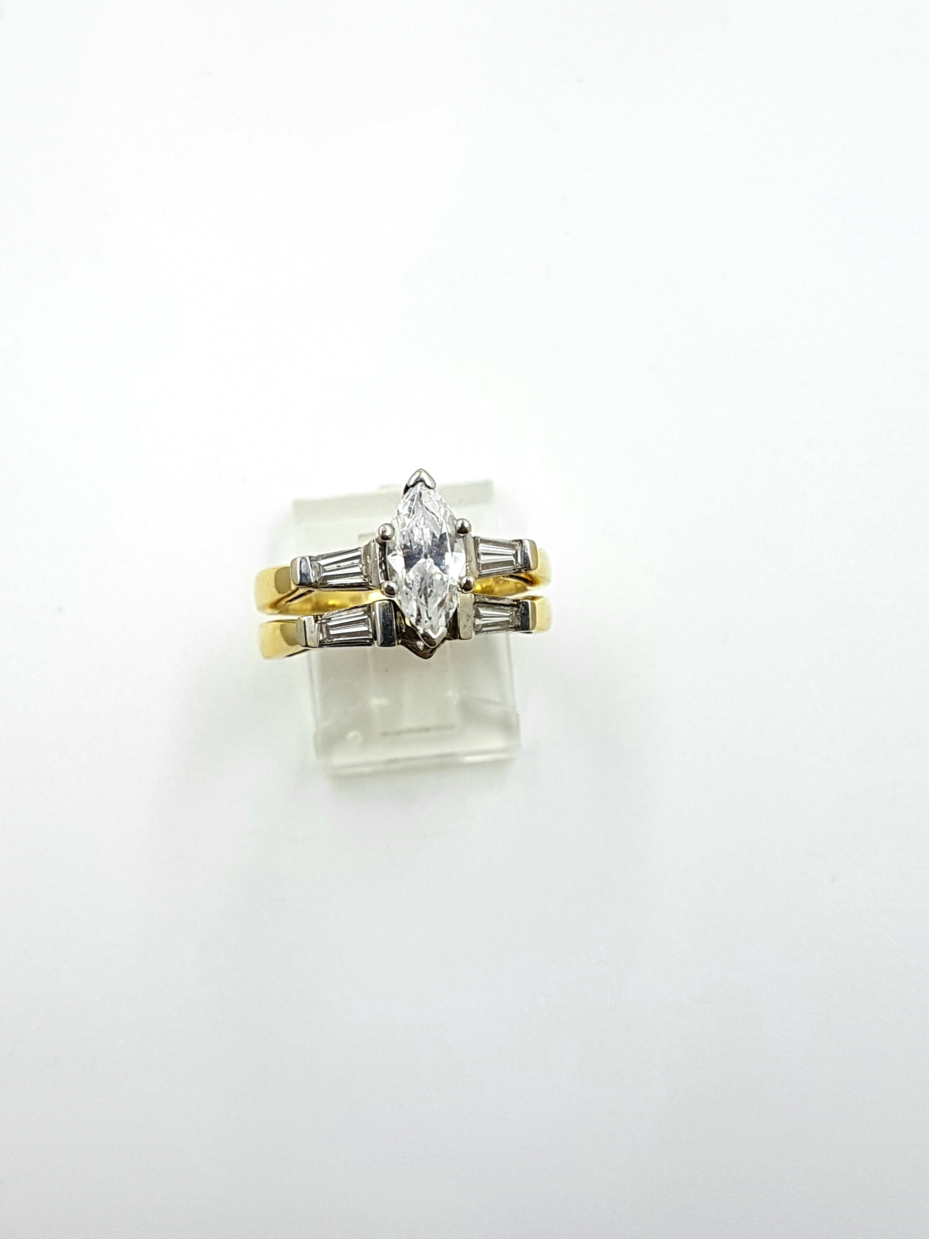Engagement Ring & Wedding Band
Center: Cubic Zirconia / Sides: 0.55ct
Regular Price $4500
SALE $1300
Ref: CM316