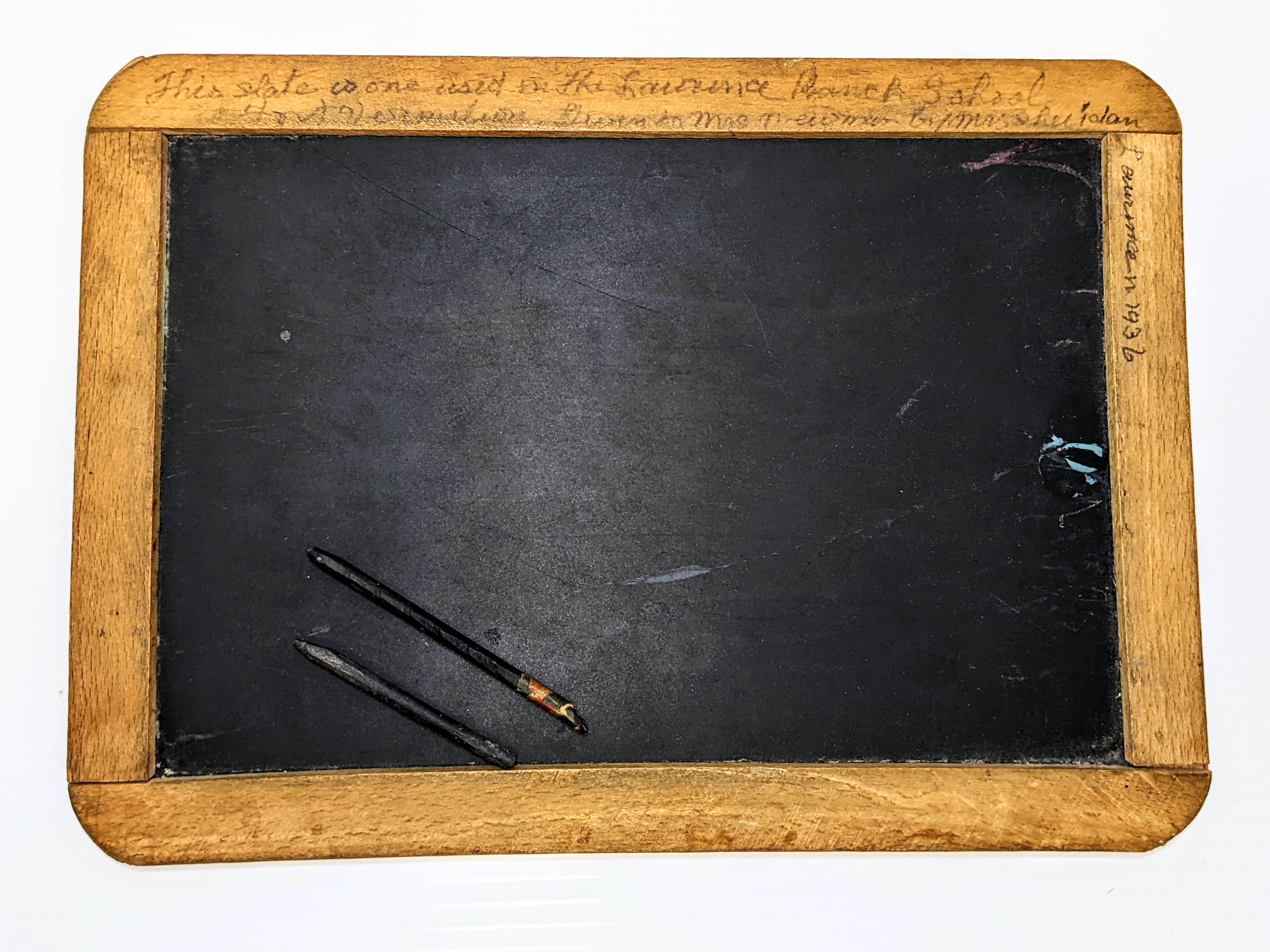 Today is the first day back to school! As such, we have chosen this slate board and pencils as the Artifact of the week! Once used at the Lawrence Ranch school - a slate like this would be used to practice writing, solving math problems- and no doubt- doodling. Paper was expensive and re-useable boards such as this one were much more economic and viable. They also required great memorization as one would have to wipe it clean to create more practice space as they continued through the lesson. Furthermore slateboards often stayed at school - meaning there was no opportunity to study at home and one had to have determined focus during the lesson! The lawrence Ranch school was established in 1913.
2007.67.08.01+02 / Lawrence Family 06/09/2022