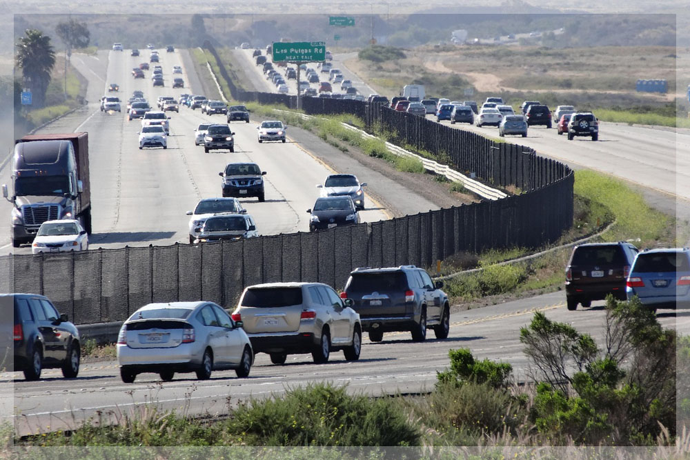 Cars driving in traffic