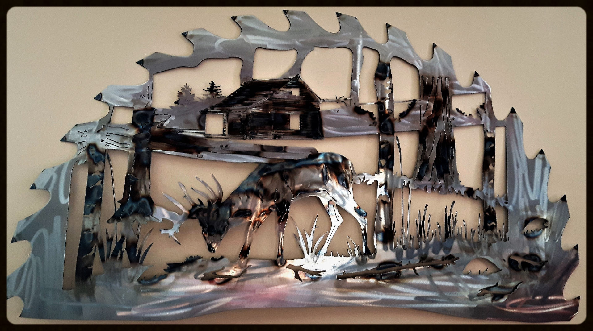Metal art, Stag scene in sawblade, Campbell river BC, Vancouver island BC, Vancouver BC, Victoria BC, British Columbia,Alberta