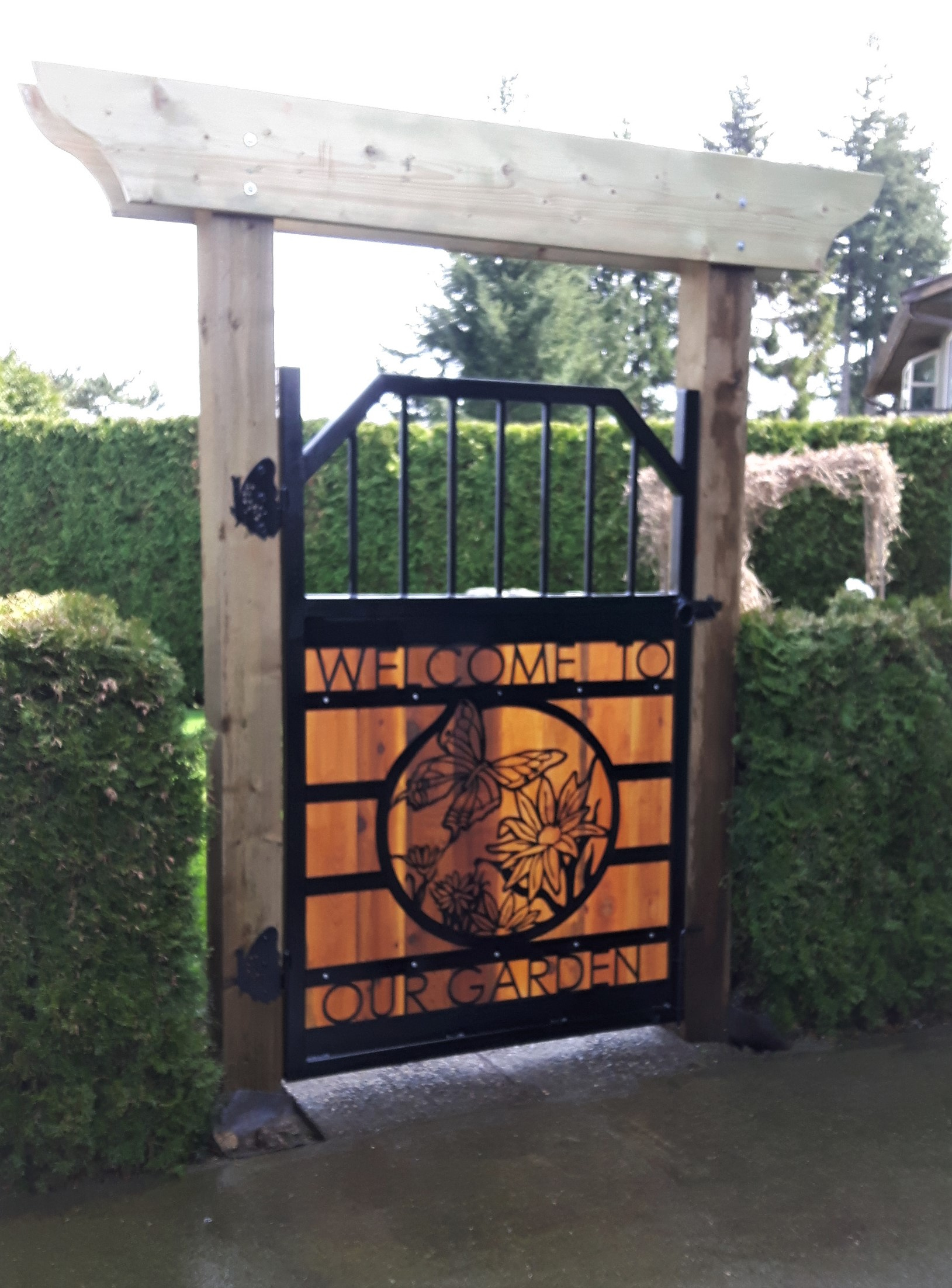 Garden gate, metal art garden gate with butterfly hinges, Campbell river BC, Vancouver island BC, Vancouver BC, Victoria BC, British Columbia,Alberta