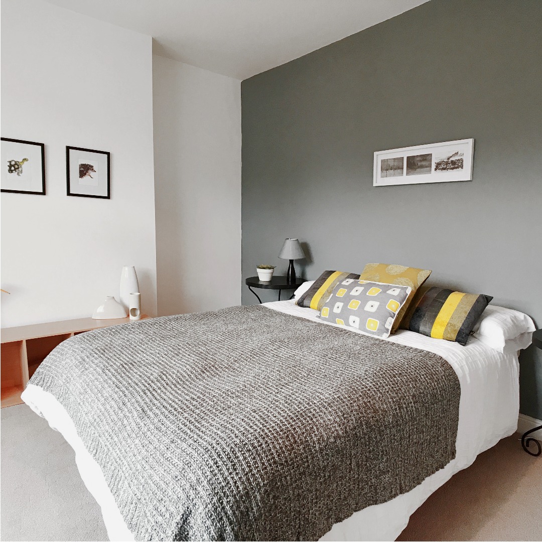 Bedroom maintained through recurring home care with organized presentation and supported environmental continuity