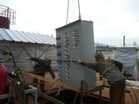 Electrical Switchboards being lowered into the vessel.