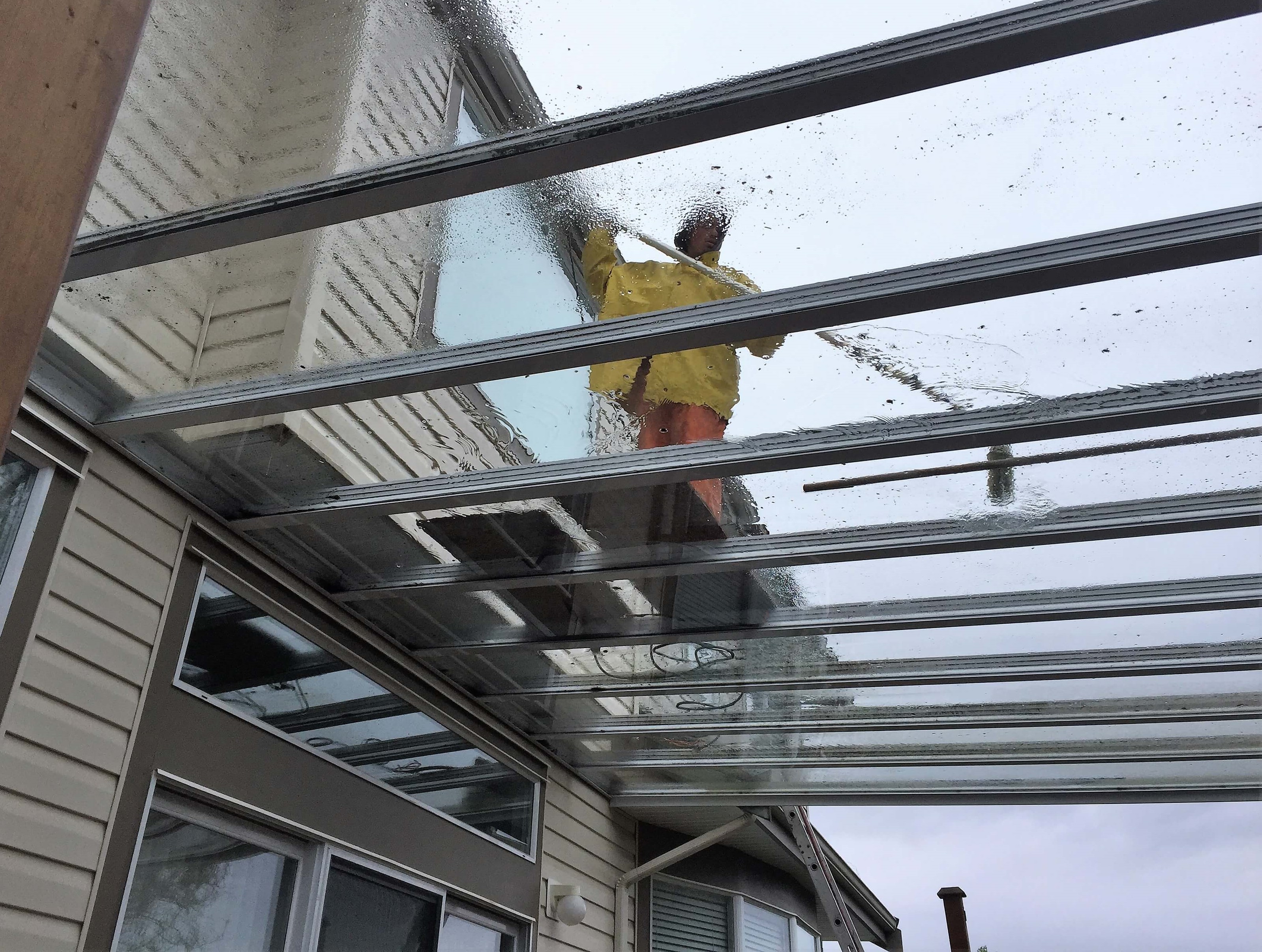 brush washing glass awning