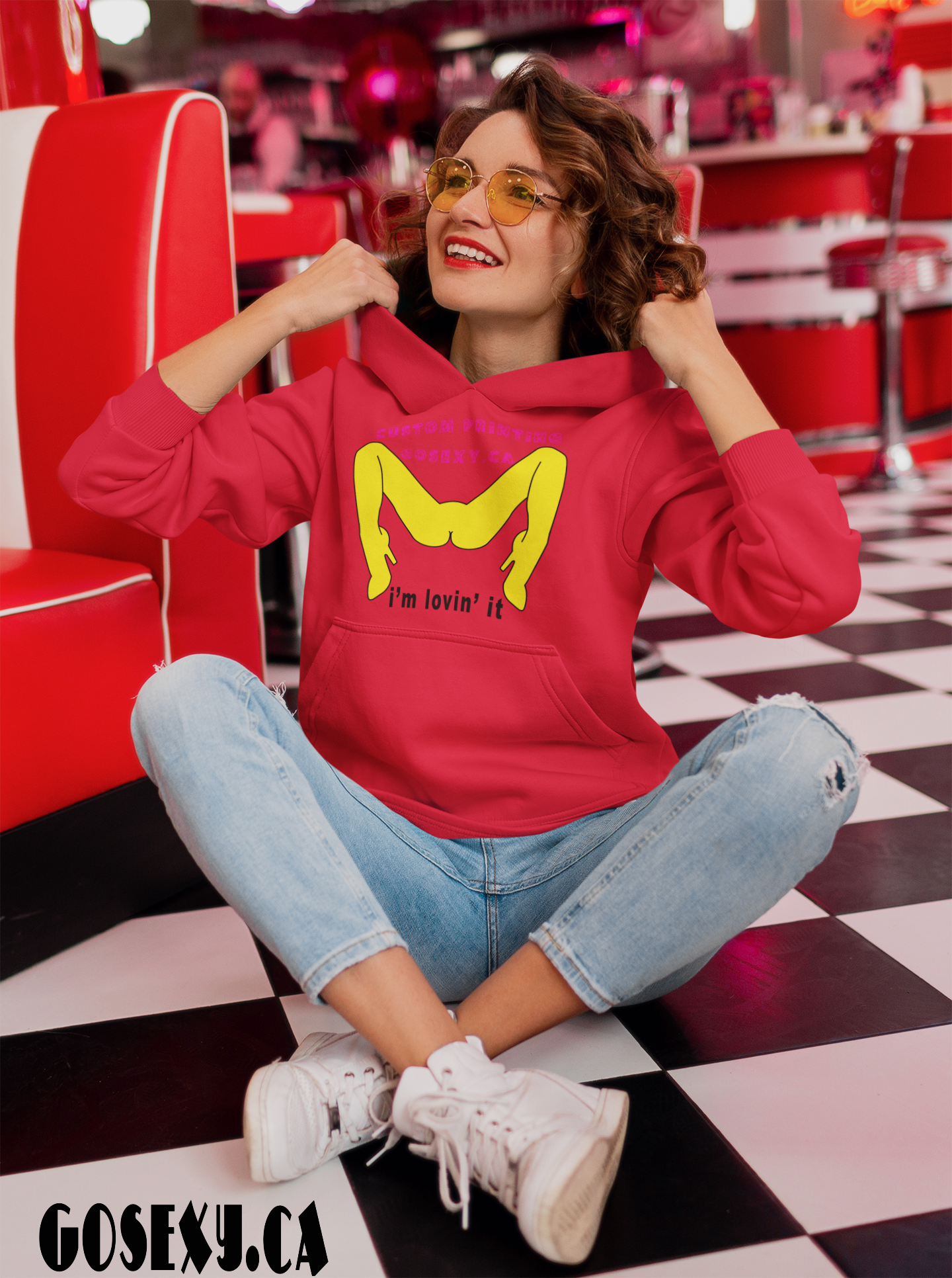 https://0901.nccdn.net/4_2/000/000/008/486/hoodie-i-am-loving-it-of-a-woman-sitting-on-the-floor-of-a-retro.png