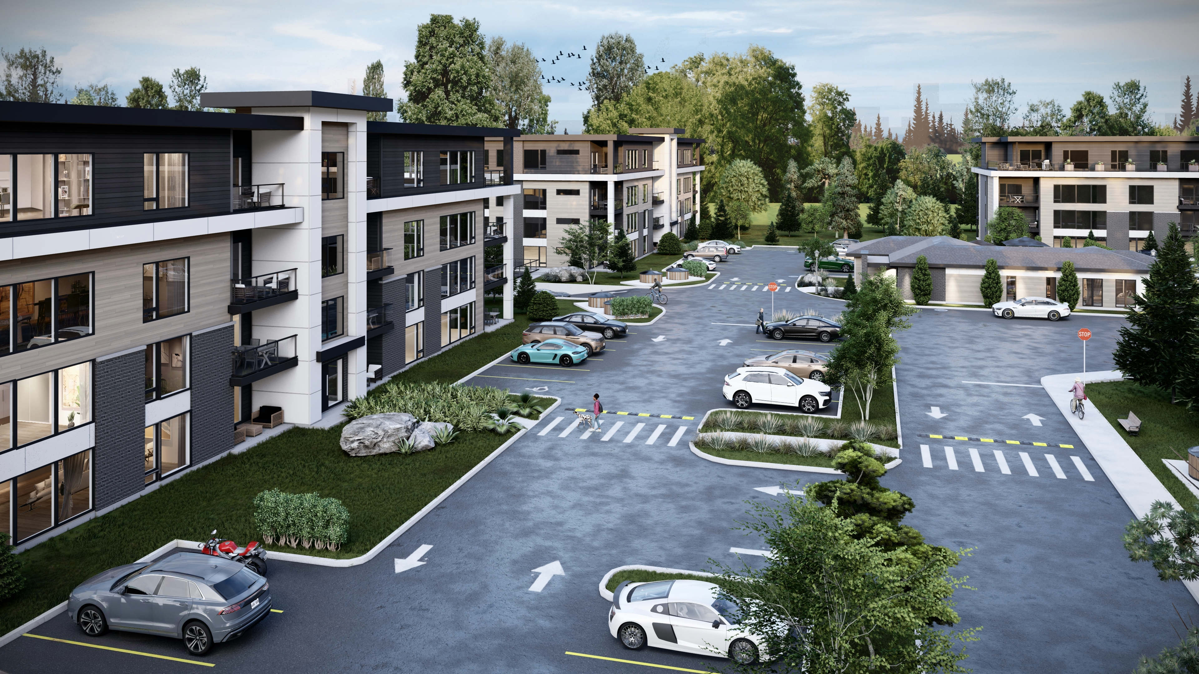 Vue d’ensemble du projet Watson Square à Lachute – quartier locatif moderne avec espaces verts, stationnement aménagé et ambiance conviviale