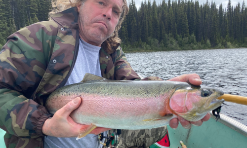 Outdoorsman Holding a Trout