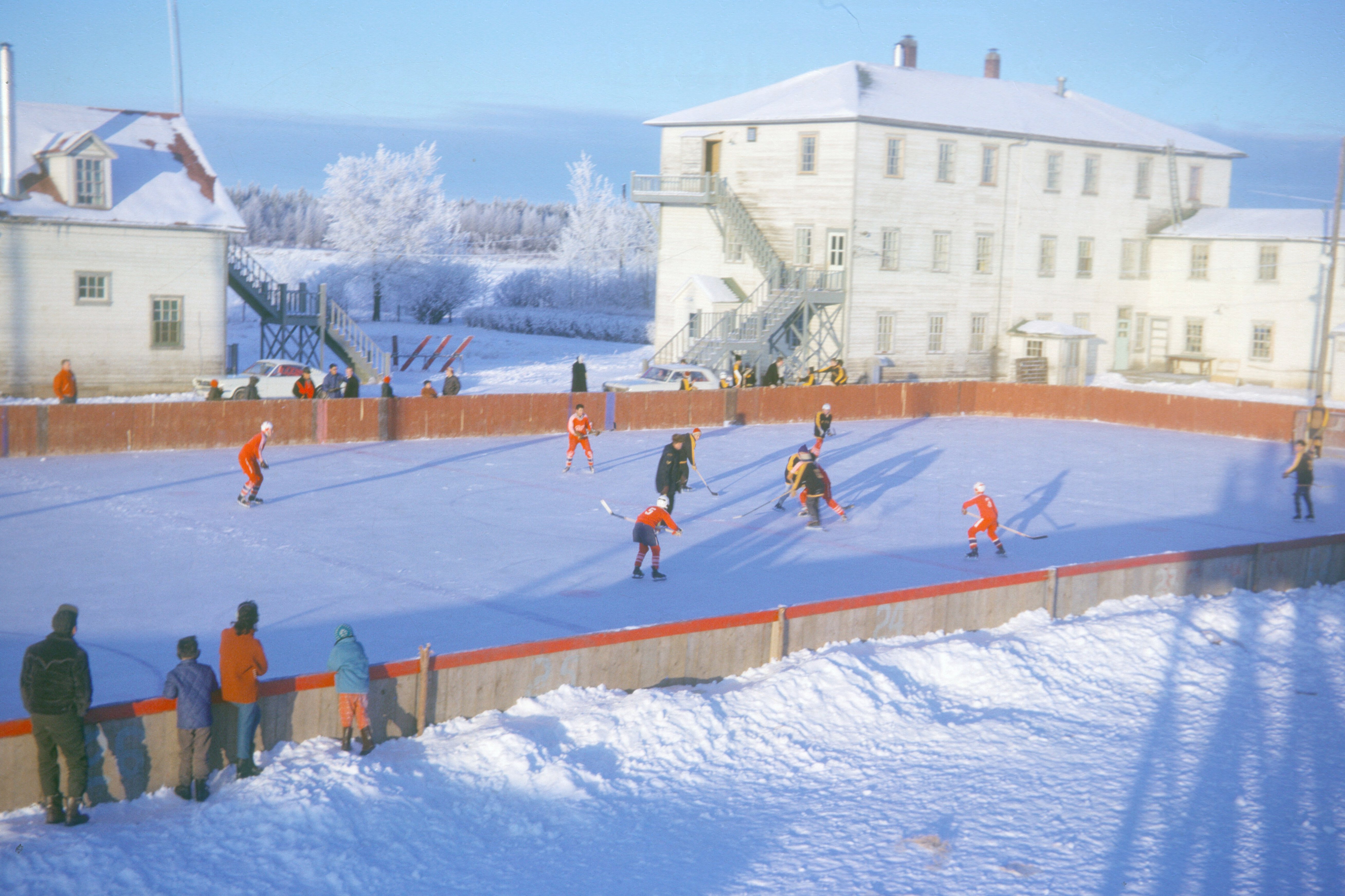 Hockey Game between Fort Vermilion's Public and residential Schools. 1966.
Photo Credit: Anthony  O'Carroll. 