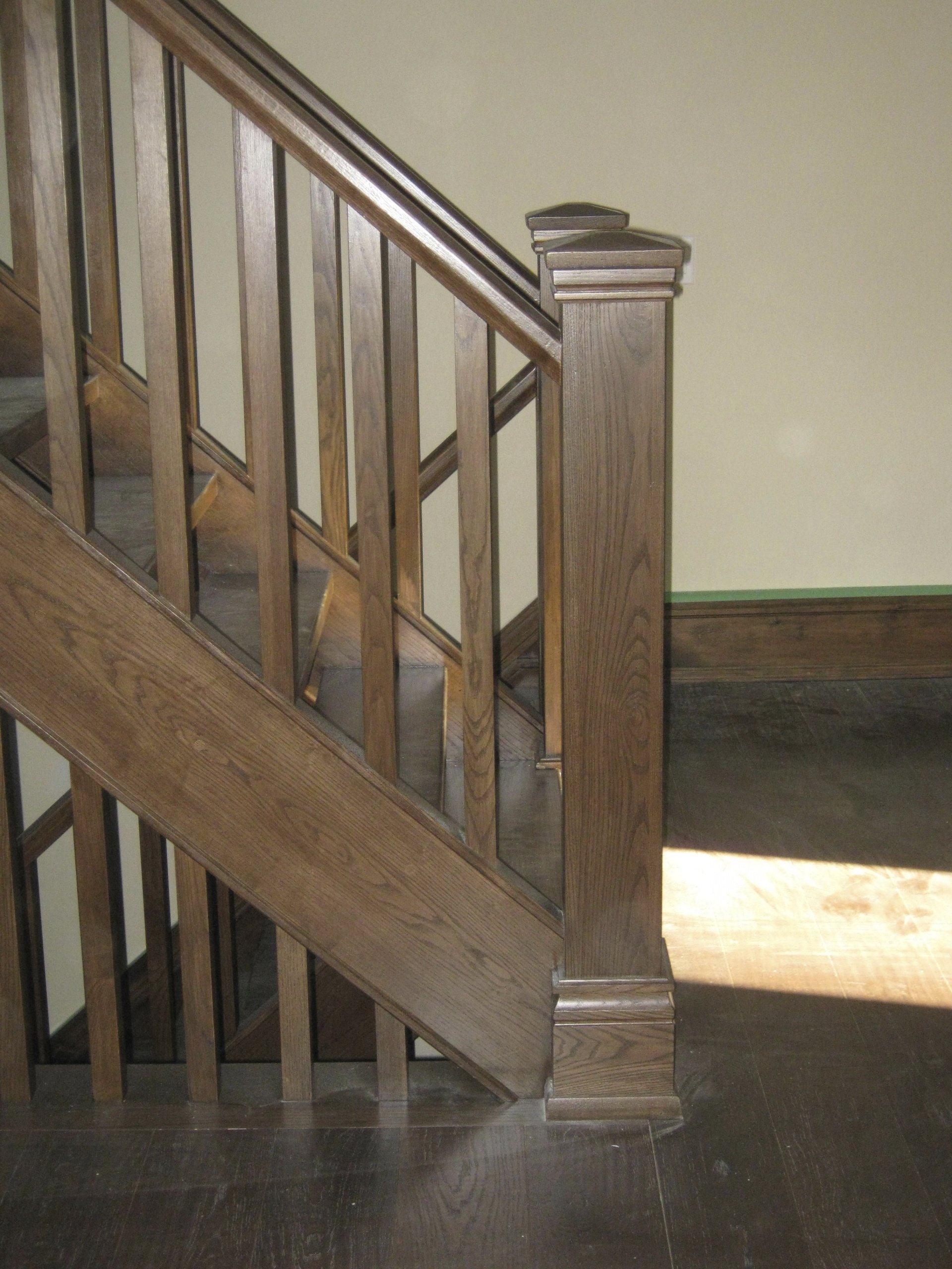 Straight ash Scandinavian style stair with closed stringers