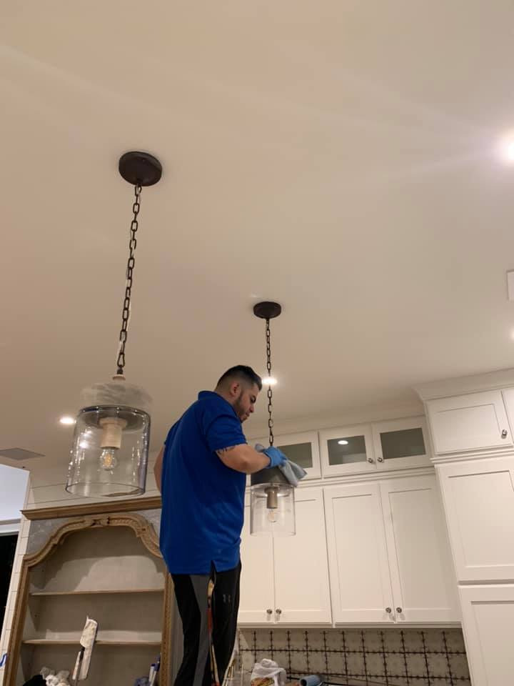 cleaning of lights and on top of cupboards
