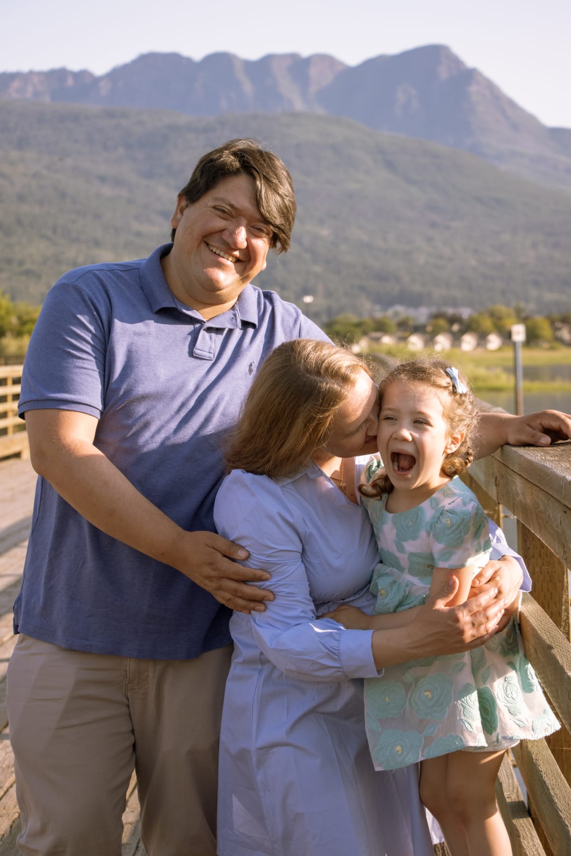 Fresh garden vegetables including tomatoes, peppers, cucumbers, broccoli, and herbs arranged on a rustic wooden table. Fresh garden vegetables including tomatoes, peppers, cucumbers, broccoli, and herbs arranged on a rustic wooden table.