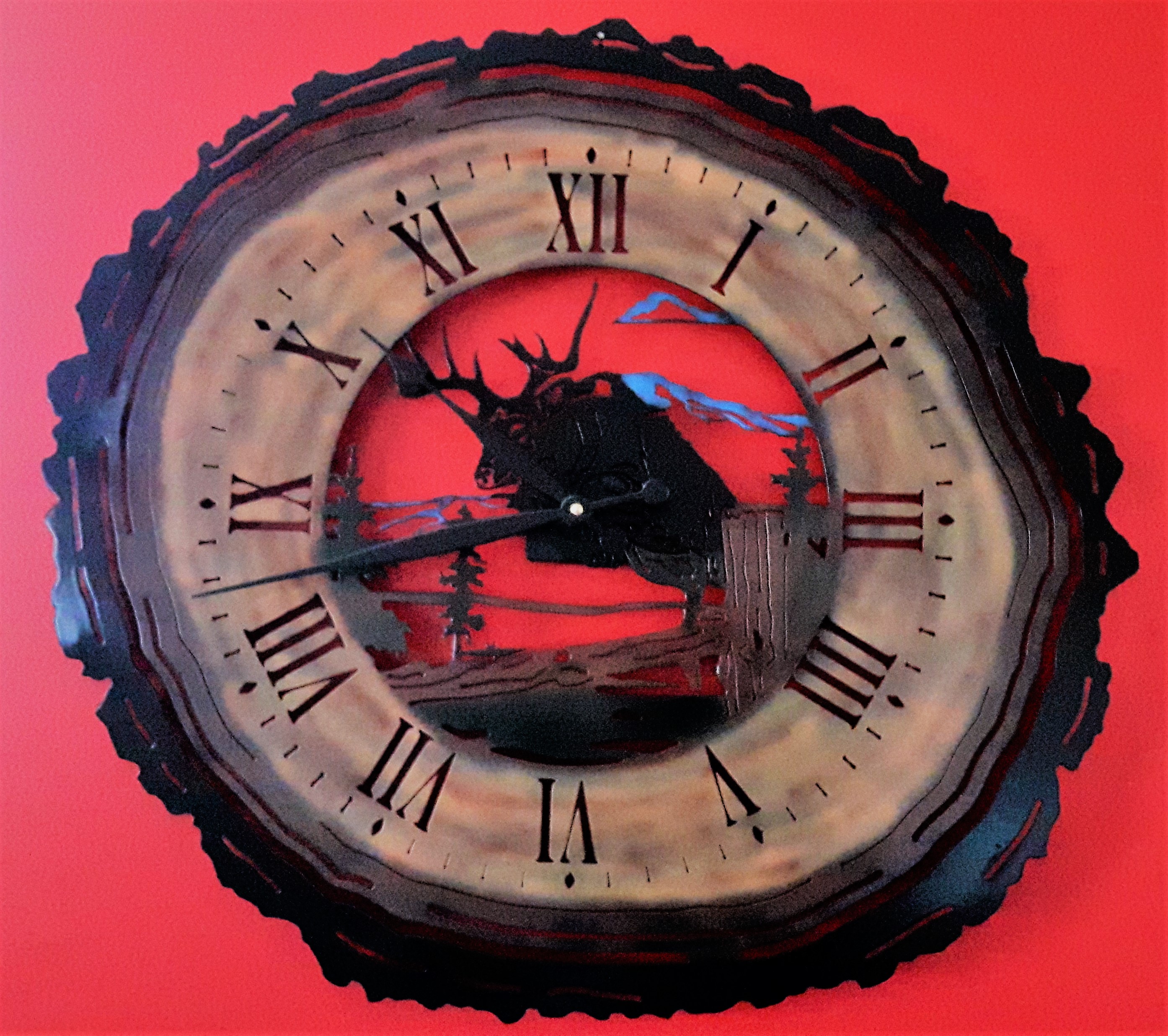 Metal art, Clock in log,Campbell river BC, Vancouver island BC, Vancouver BC, Victoria BC, British Columbia,Alberta