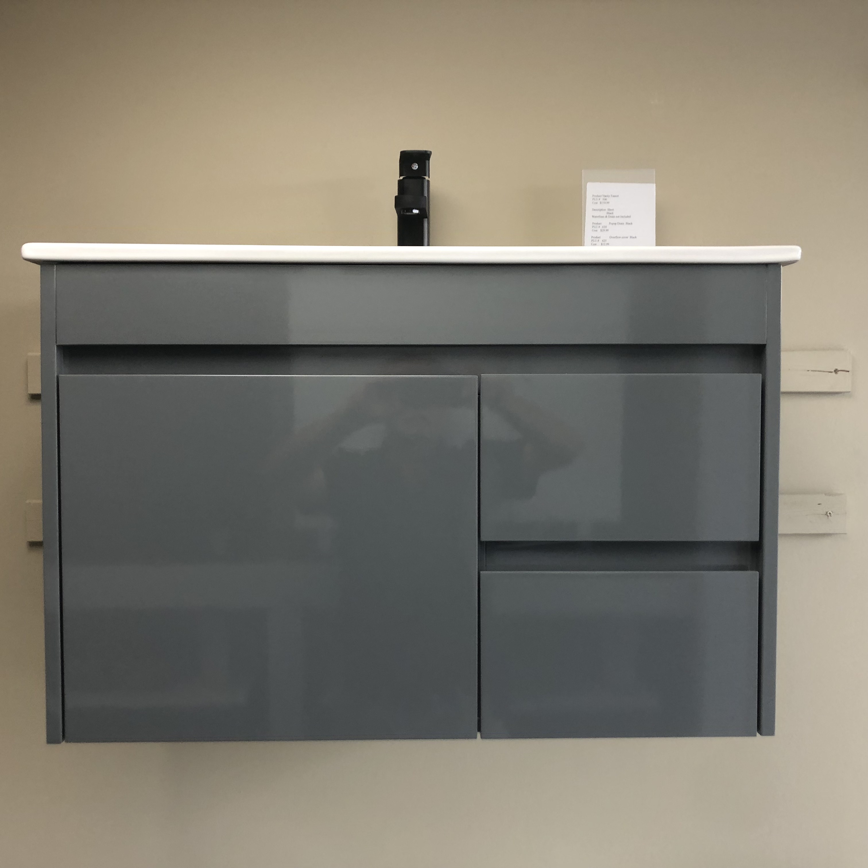 Modern bathroom with freestanding bathtub, glass shower, floating vanity, large window, and indoor plants.