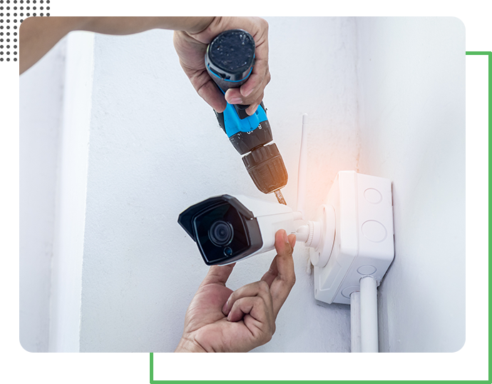 Technician installing wireless CCTV