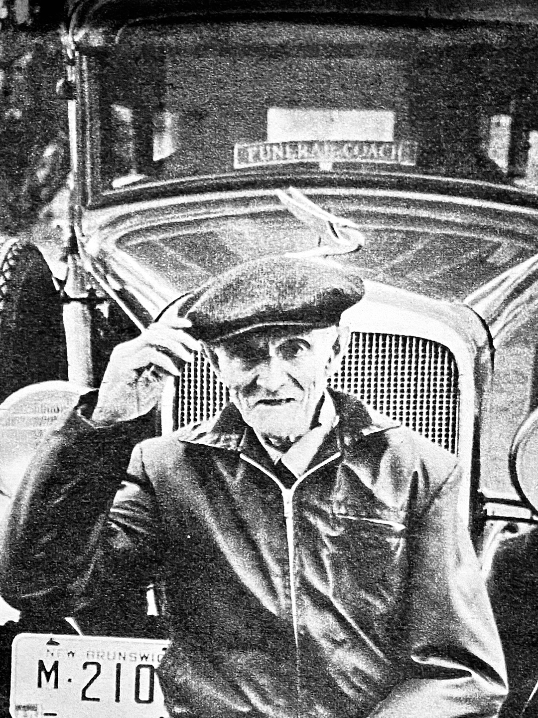 Johnny Graham with his Cadillac hearse near the end of his long career.