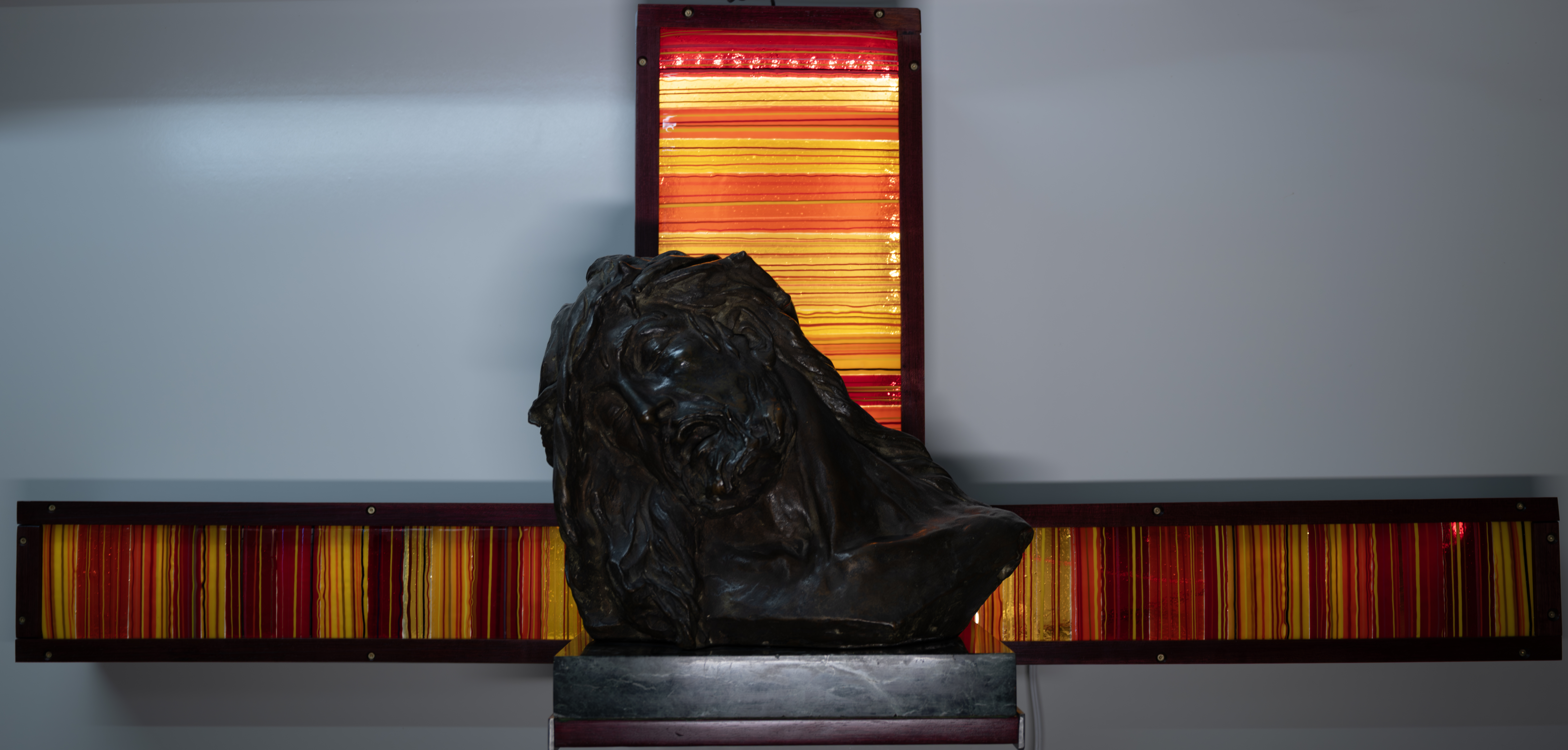 cast bronze jesus from a quebex abby, blended with my fused glass box and shelf