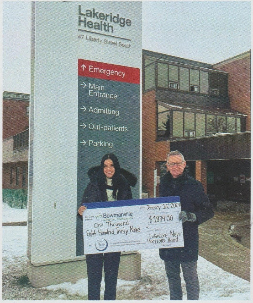 Larry Down presenting donation cheque from the band concert to Bowmanville Hospital Foundation spokesperson.