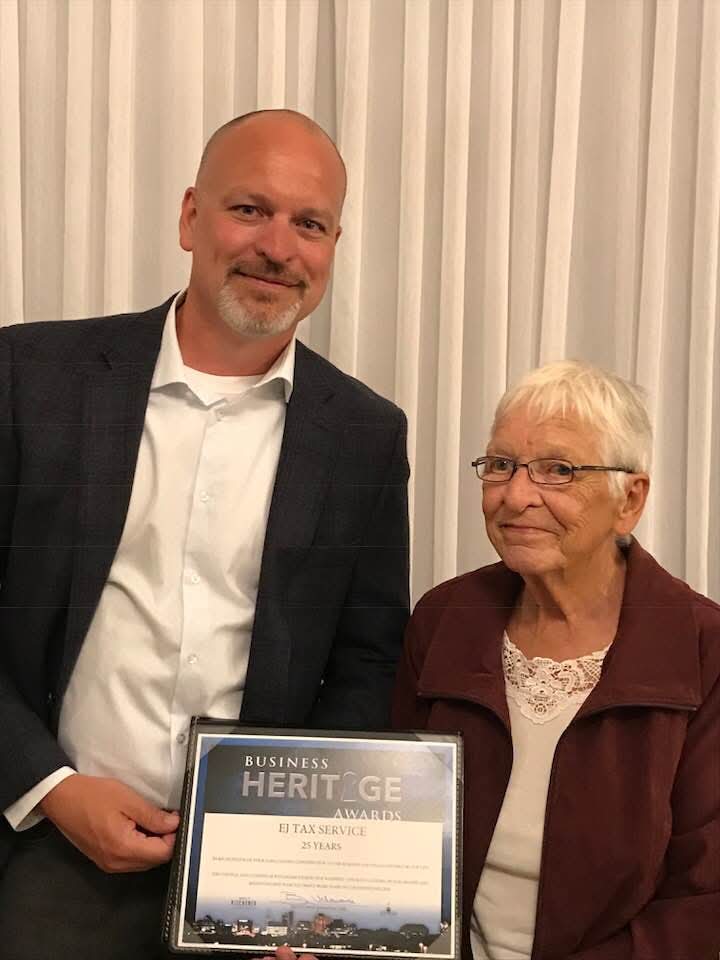 Modern tax service office reception area with plants, wooden accents, and lighting, featuring 'EJ Tax Service' signage.
Modern tax service office reception area with plants, wooden accents, and lighting, featuring 'EJ Tax Service' signage.