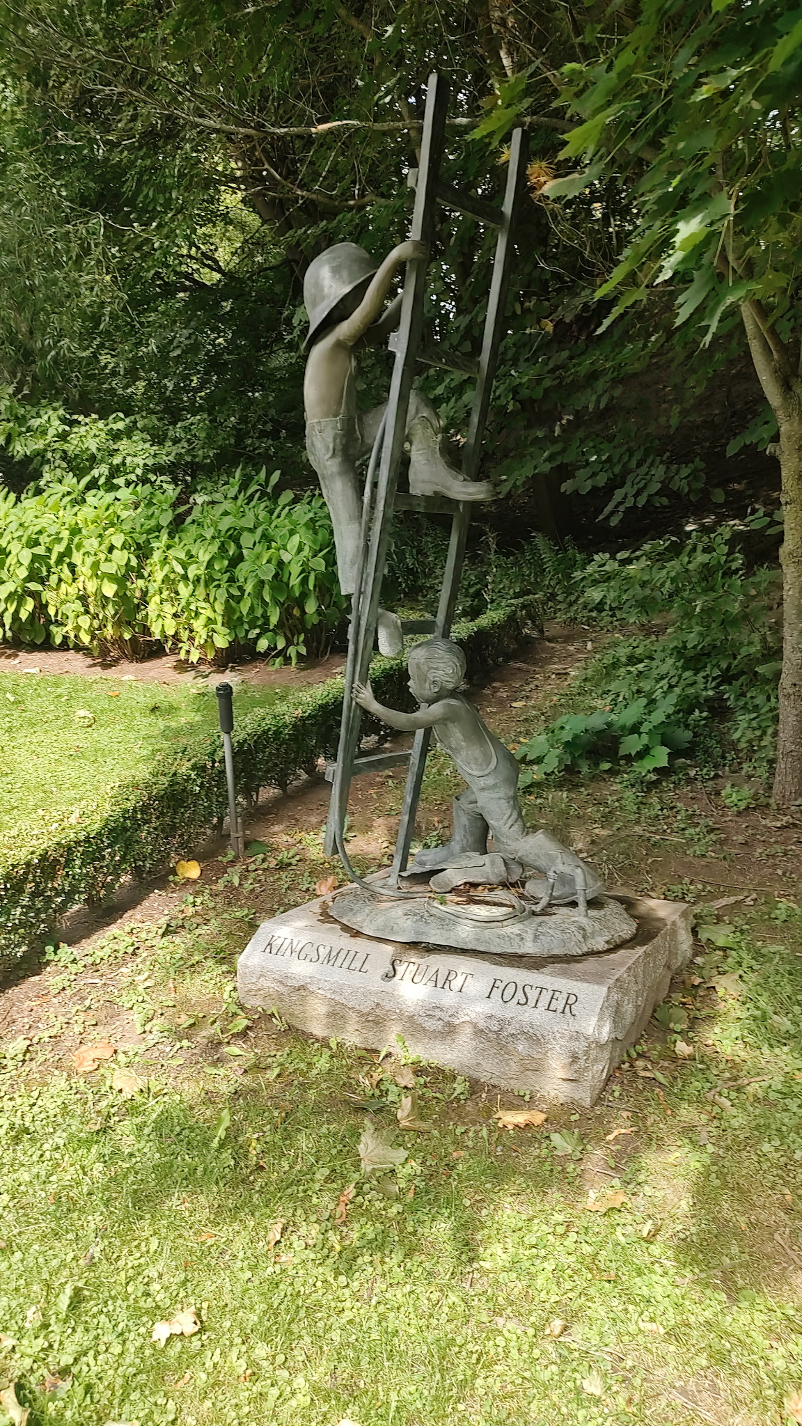 two people in white dresses in a forest