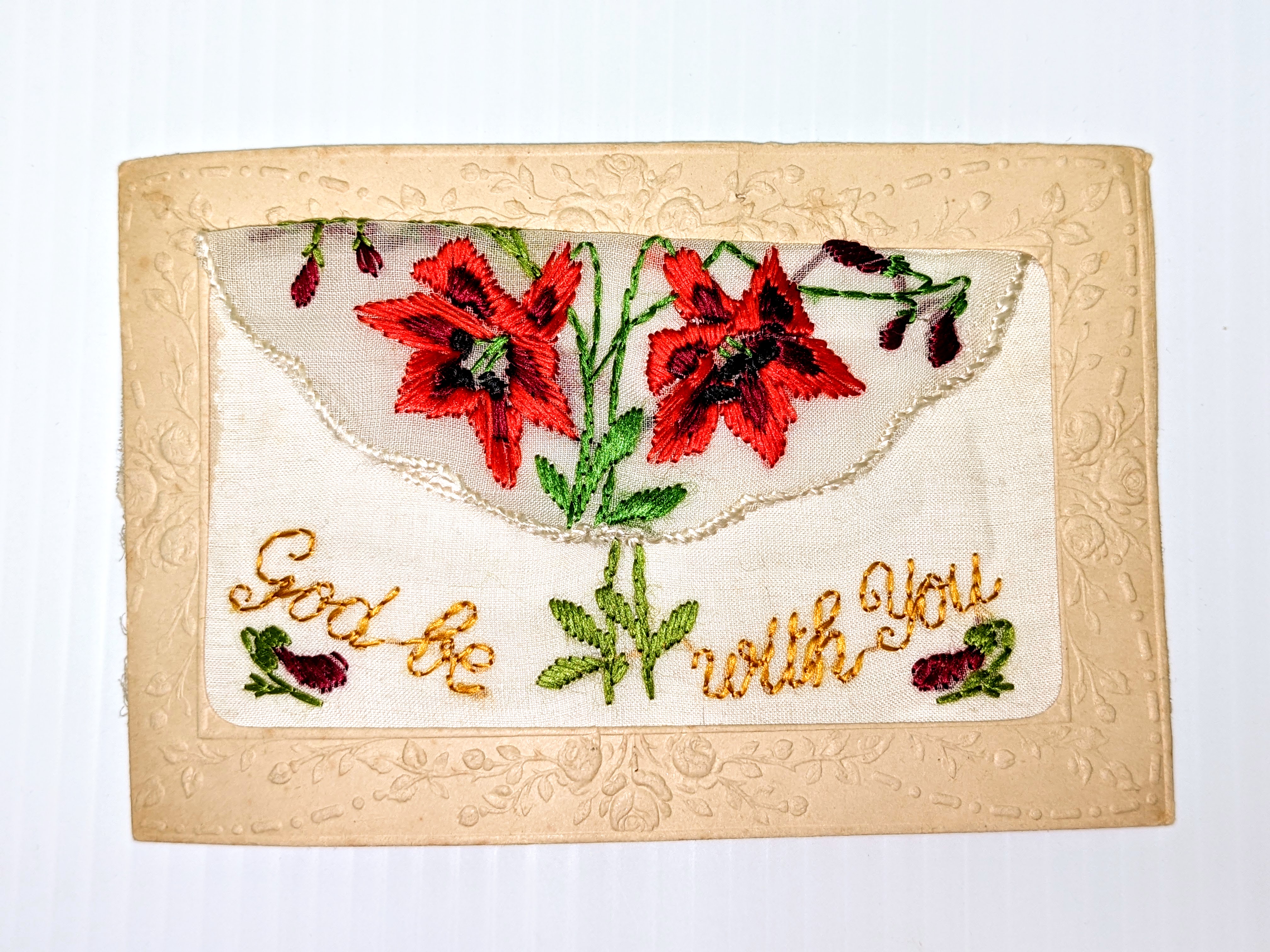 It being Valentines day today - we opted to choose a love letter for the Artifact of the week! The letter is written on the back of this handmade, intricately detailed, and unique postcard. The front boasts an embroidered fabric Pouch in which a card or small handkerchief was held. On the back side the letter is written in pencil by one "Ken" and sent to "Belle". Although the letter is not full of eloquent words of undying affection - it speaks of an honest love spanning time and space; for it appears Ken is a soldier overseas. He describes "It is something to be contented and safe during these tough times" and the letter is dated "France March 17, 1918".
14/02/2022
Hitchcock, Eunice / 998.3.7
PS. If you have any information about who "Ken" and "Belle" may be - please let us know!