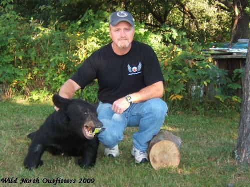 https://0901.nccdn.net/4_2/000/000/019/c2c/steve-ontario-guided-bear-hunt-success.jpg