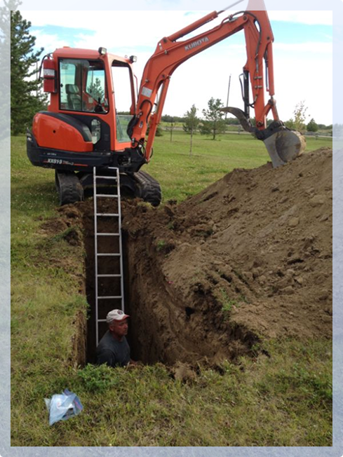 An orange tractor and a ladder into the ground