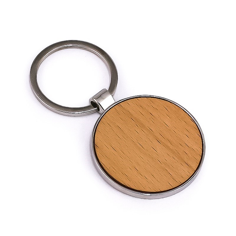 Man wearing a black t-shirt with bold yellow text reading 'YOUR BRAND ON ANYTHING' standing indoors.