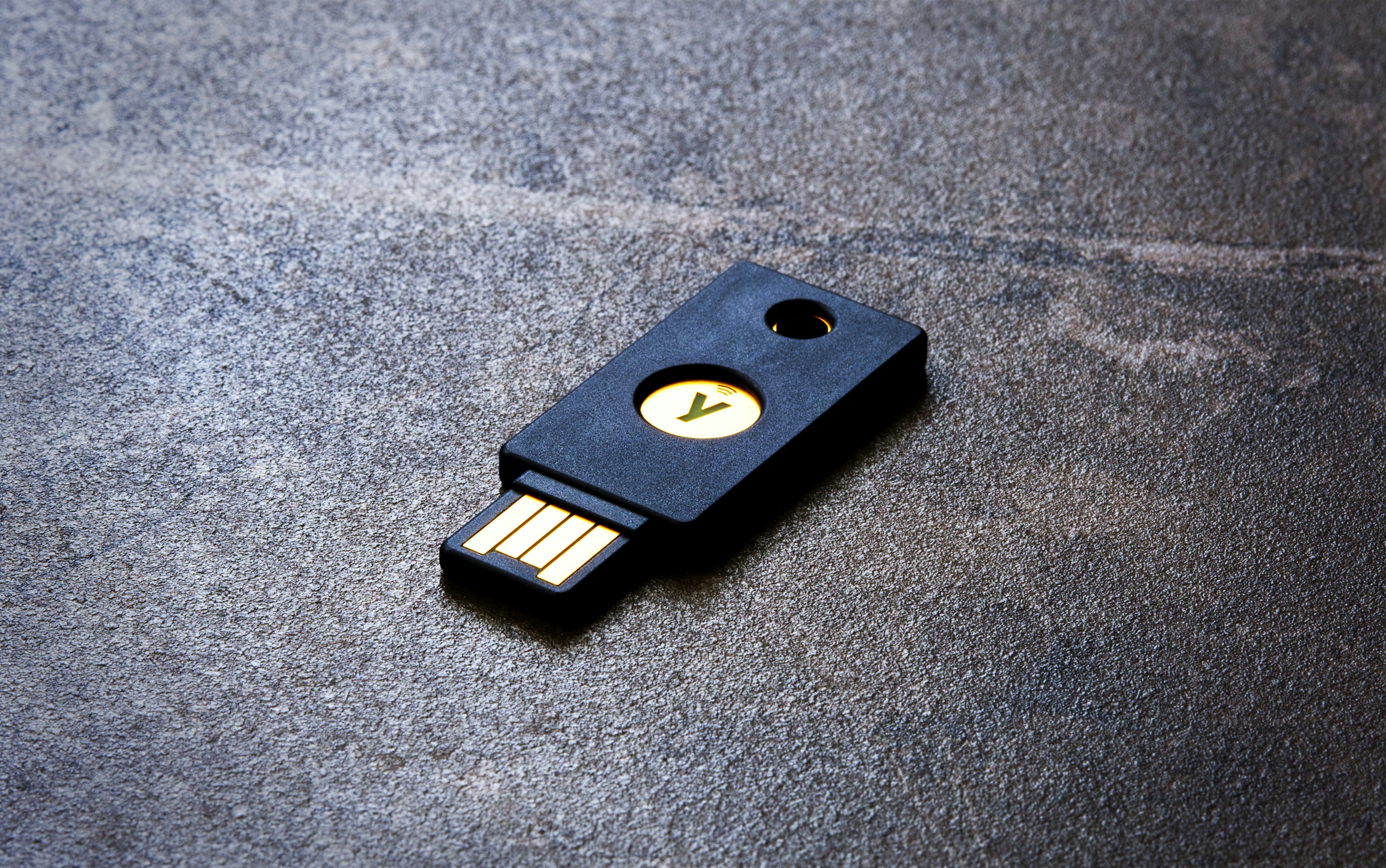 a close up of a usb stick on a surface