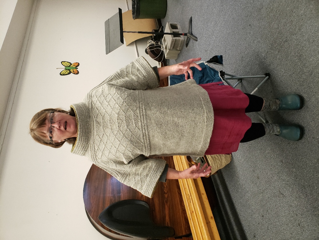 Grace showing us her beautiful hand-knit  Norfolk Slop sweater.