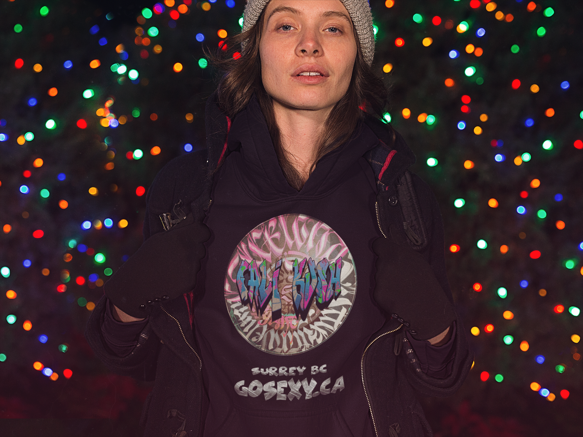 https://0901.nccdn.net/4_2/000/000/020/0be/lovely-woman-wearing-a-hoodie-with-a-jacket-in-front-of-christma.png