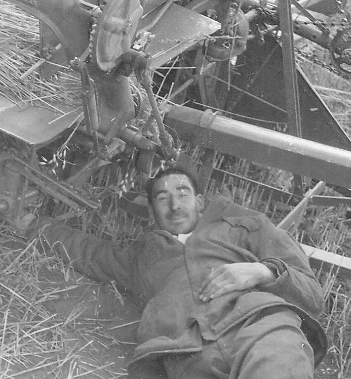 This gentleman is caught in the middle of a job which appears to be fixing or unplugging a John Deere Grain Binder. The photos date is August 14 1952 and comes from the Experimental Farm collection. Let us know if you recognize this hardworking chap! With more research we discovered the payroll records for the Experimental Farm from 1952. Laborer's hired from Aug 1- 30 of 52' are as follows. E. Charles / A. Flett / R.W. Knight / A. McLean / J. A Newman / A.R. Campbell / Allan Charles, Cecil Charles, Ernest Charles, O. McAteer Murray Mitchell R.W. Randle, Ernest Smith, P. Tardiff (Junior Labourers) / R.A. Clarke / G. Flett / M. Gross / Mrs. M. Lapp / E.M. Lawrence / A. McAteer / O. McAteer / R. McLean / Wm. McLean / G. Mitchell / A. Lizotte / R. Randle / E. Rivard. Do any of these names match the fellow working?
993.4.37.4 / Agriculture Canada