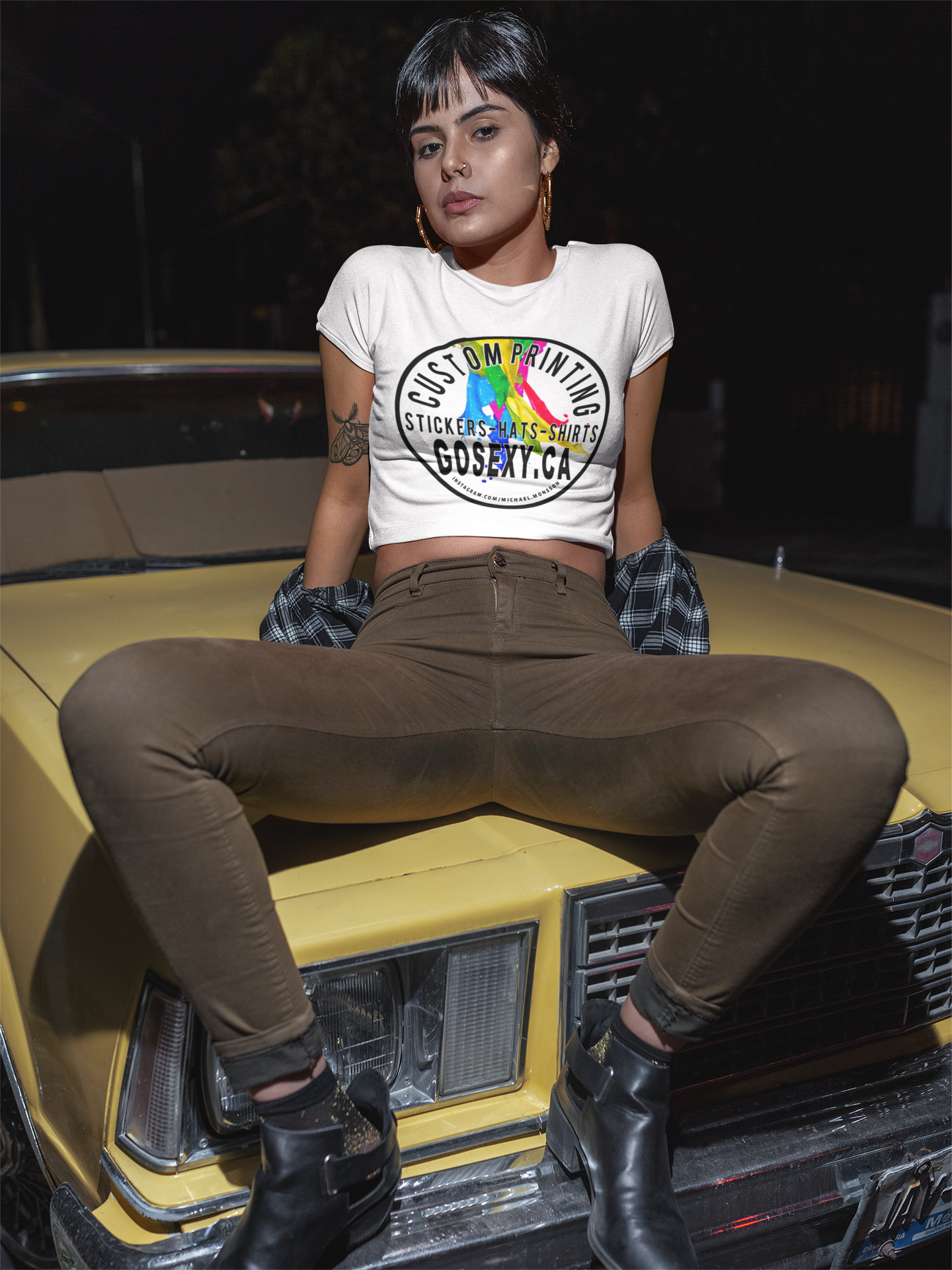https://0901.nccdn.net/4_2/000/000/023/130/latin-girl-wearing-a-tshirt-sitting-on-the-hood-of-a-car-gosexyc.png