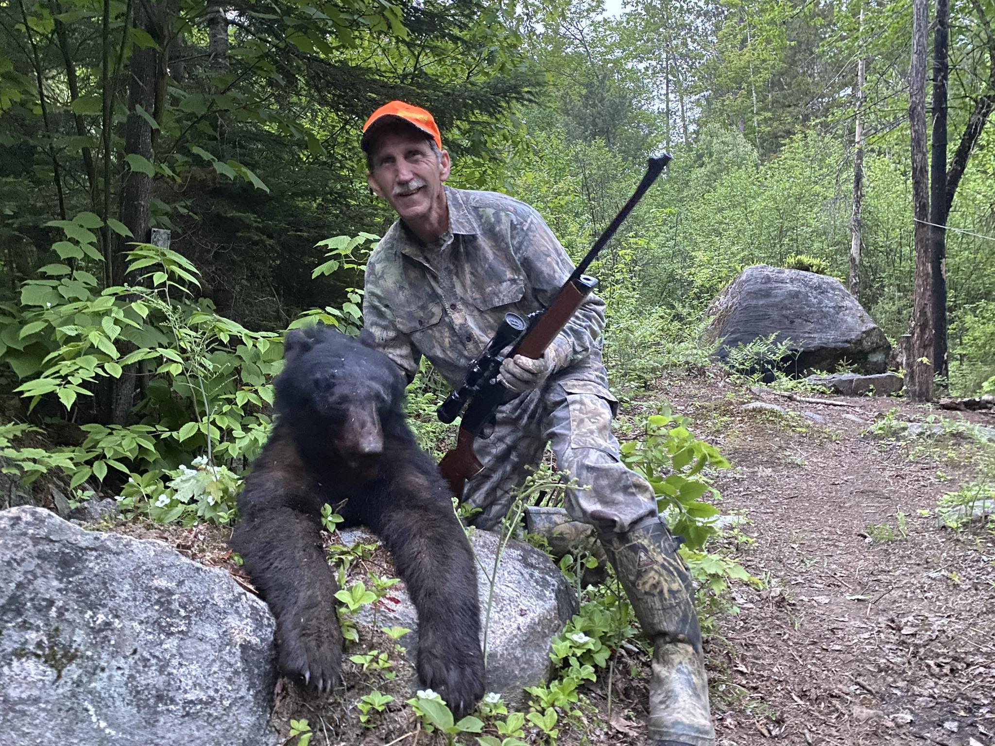 Wild North Outfitters guest with a successful Ontario black bear harvest.