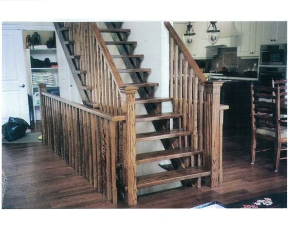 Straight red oak Scandinavian style stair with open stringers