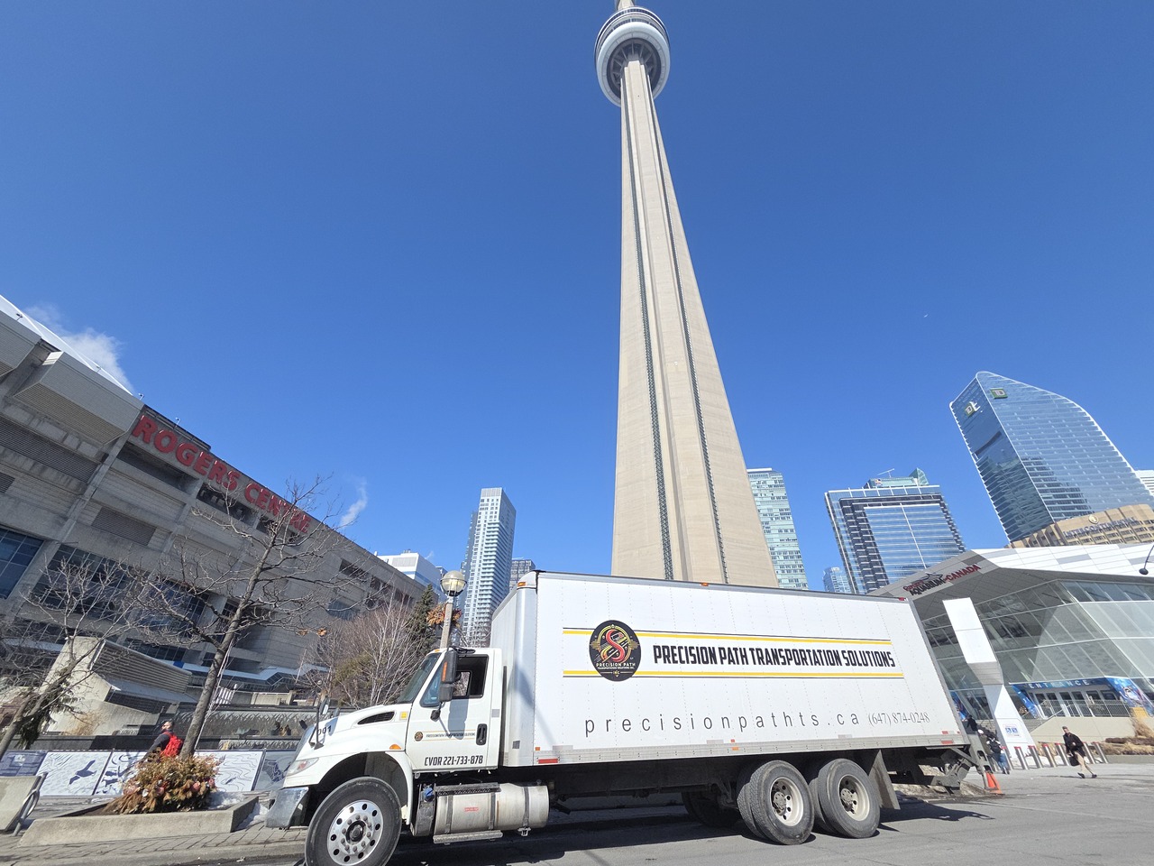 a small plane is parked on a grassy field