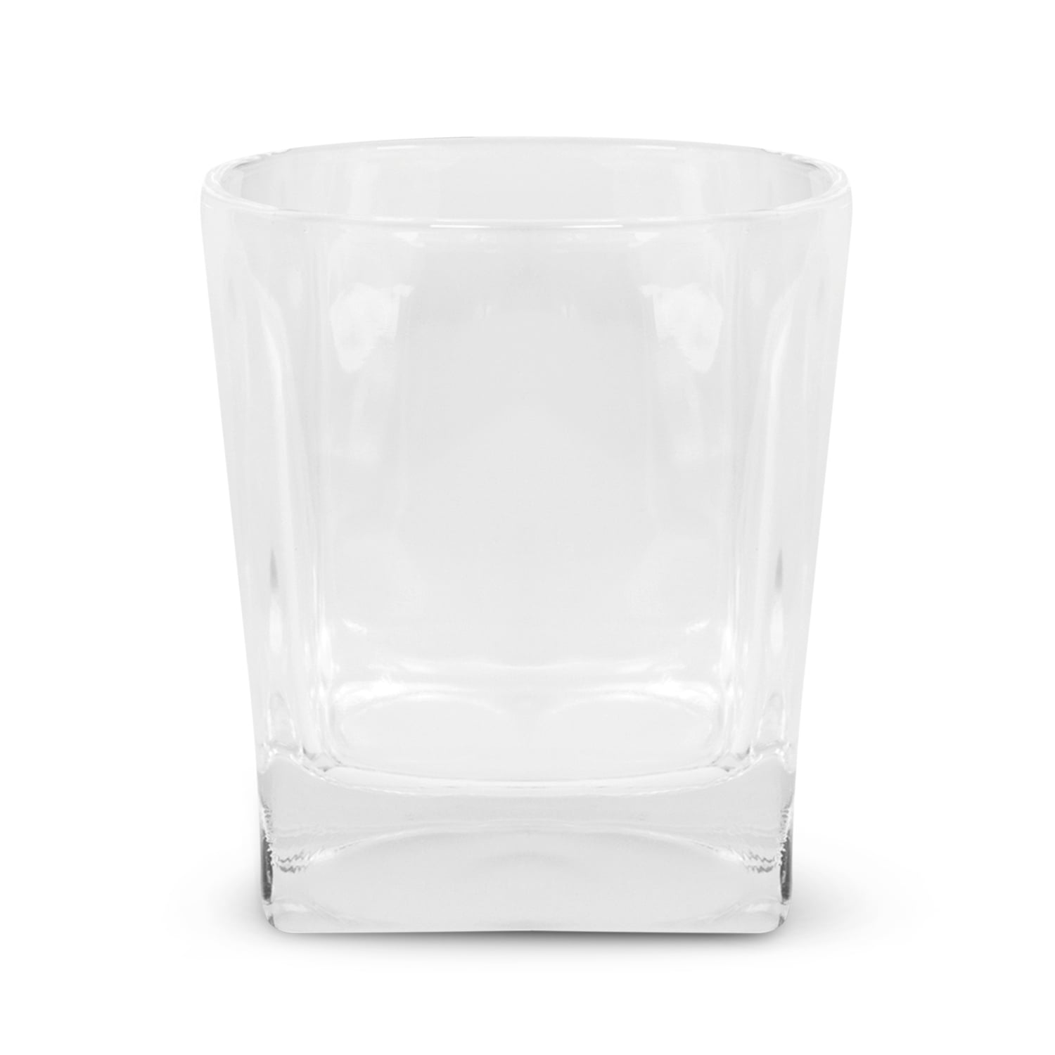 a woman sitting on the side of a road next to a red bag