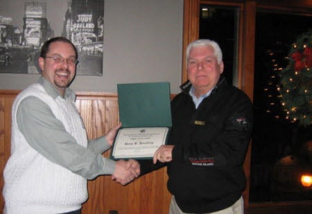 Chapter President Kevin Clannon (L) presents Gary Hoadley with an ASHRAE Service Award at the December Chapter Meeting