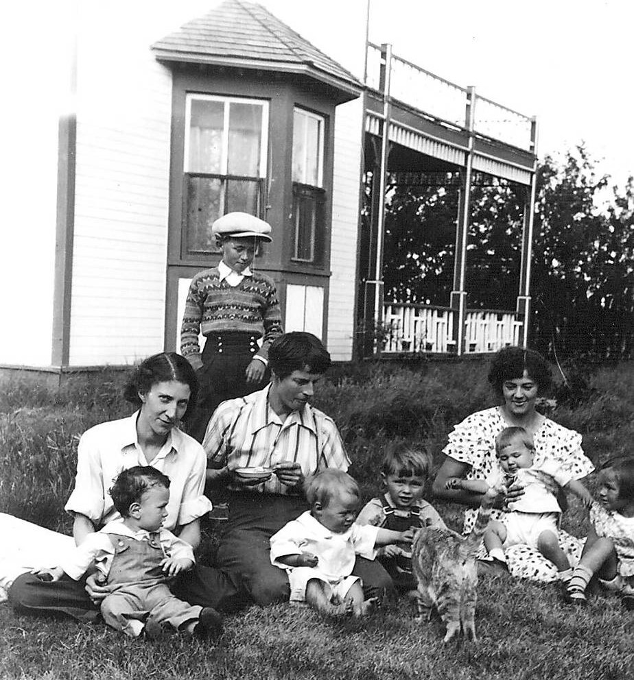 This is a photo of a picnic in front of the Old Bay house from 1930. You may recognize the distinct railing of the front porch and bay window from the north side of the house. What we don't recognize is who these mothers and children are. If you have any leads - please let us know!
2003.08.16 / Henry, Jim
---EDIT---
(L-R) Olive Bresse with son Jay; Rachel Sibbald with sons Cory and Anthony; Jim Henry standing; Valle’ Gray with Roberta and Patricia. 1937/ 1938