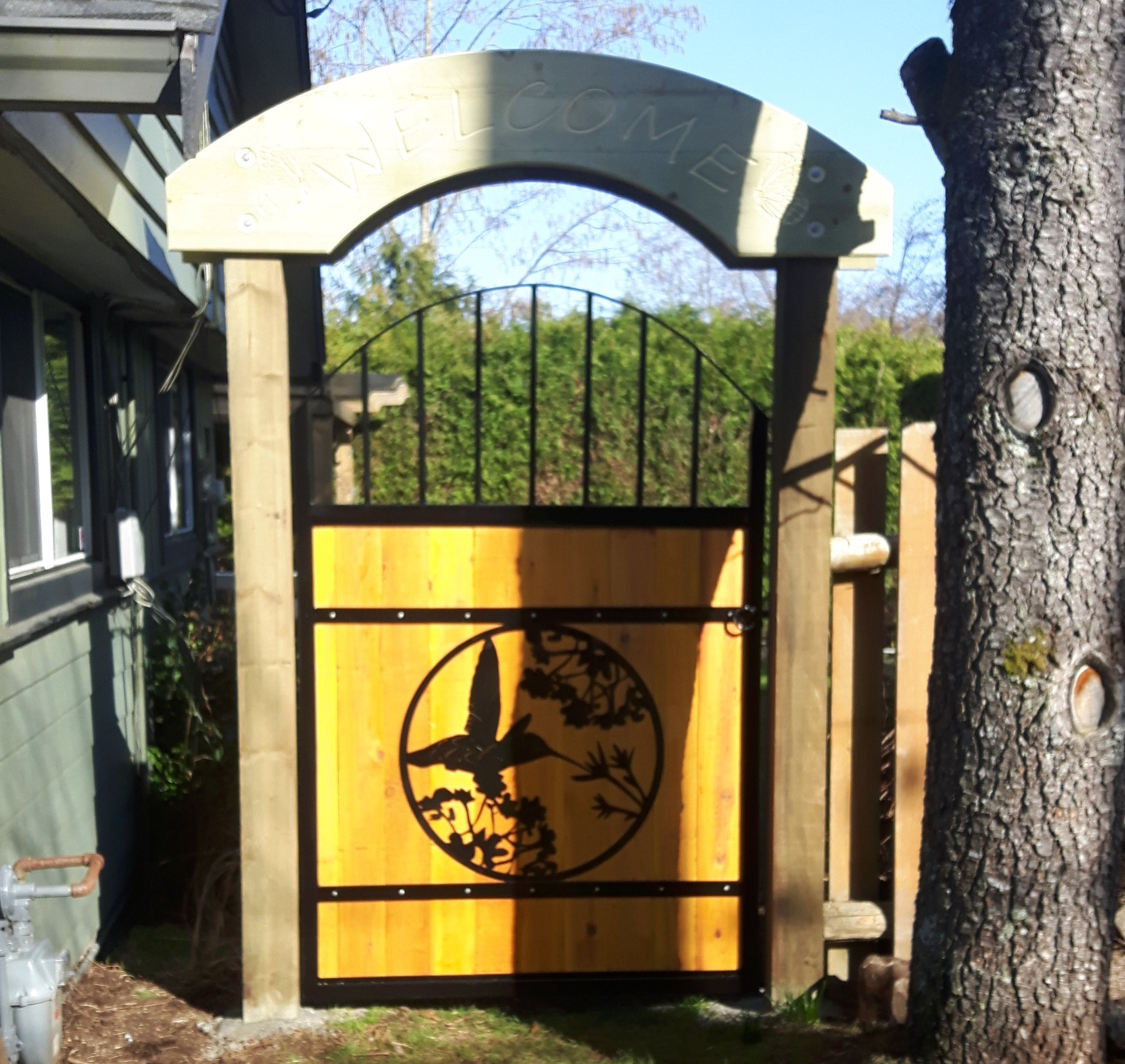 Gate, Humming bird Metal art gate with carved arbor, Campbell river BC, Vancouver island BC, Vancouver BC, Victoria BC, British Columbia,Alberta