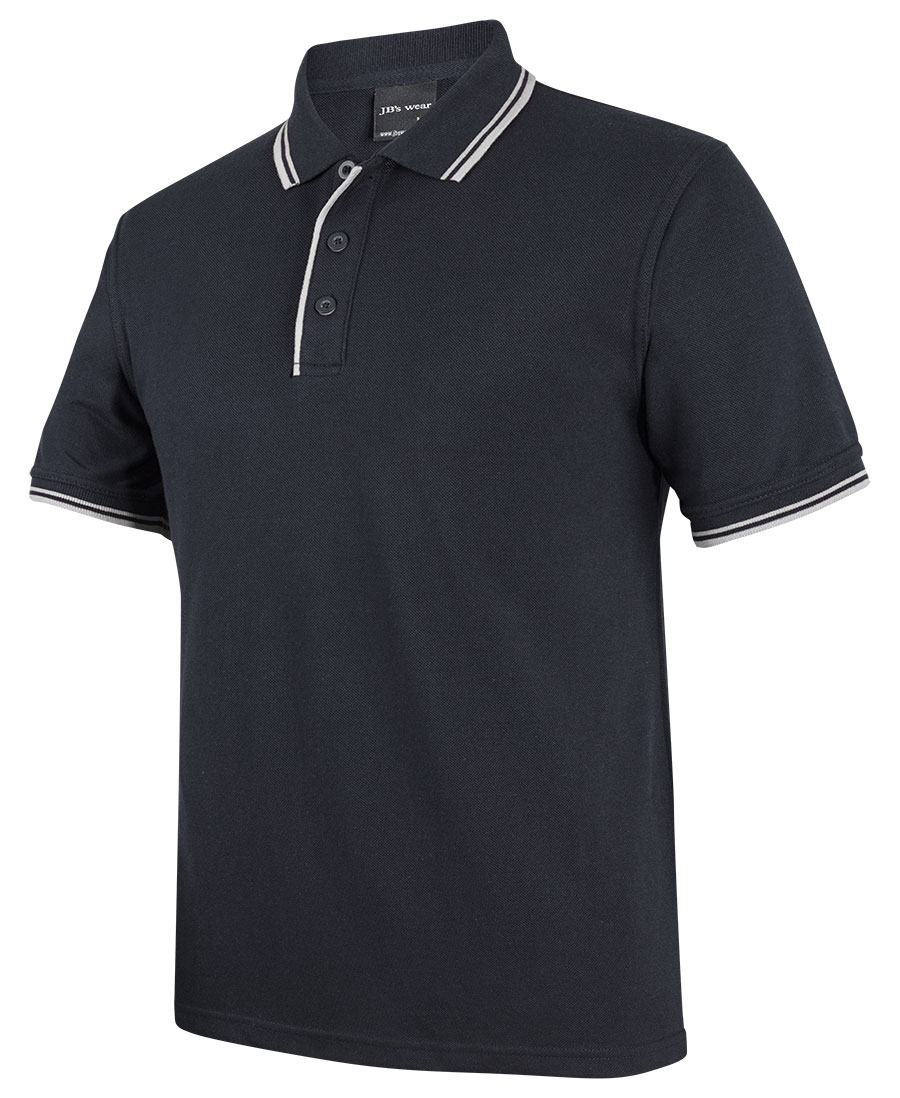 a blurry photo of a fence and a tree