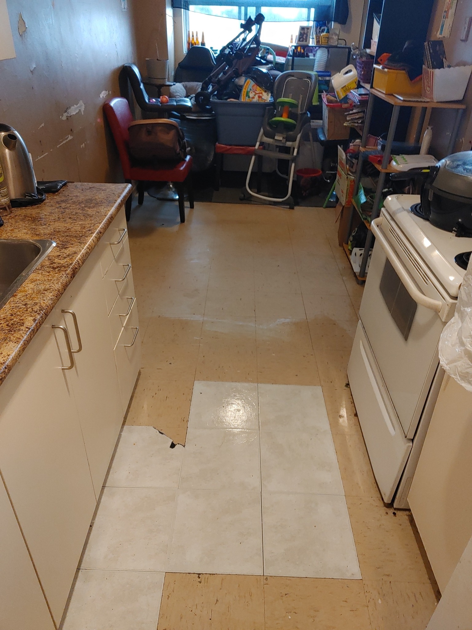 Kitchen improved following neglected property restoration with clutter reduced and the environment returned to improved functional condition