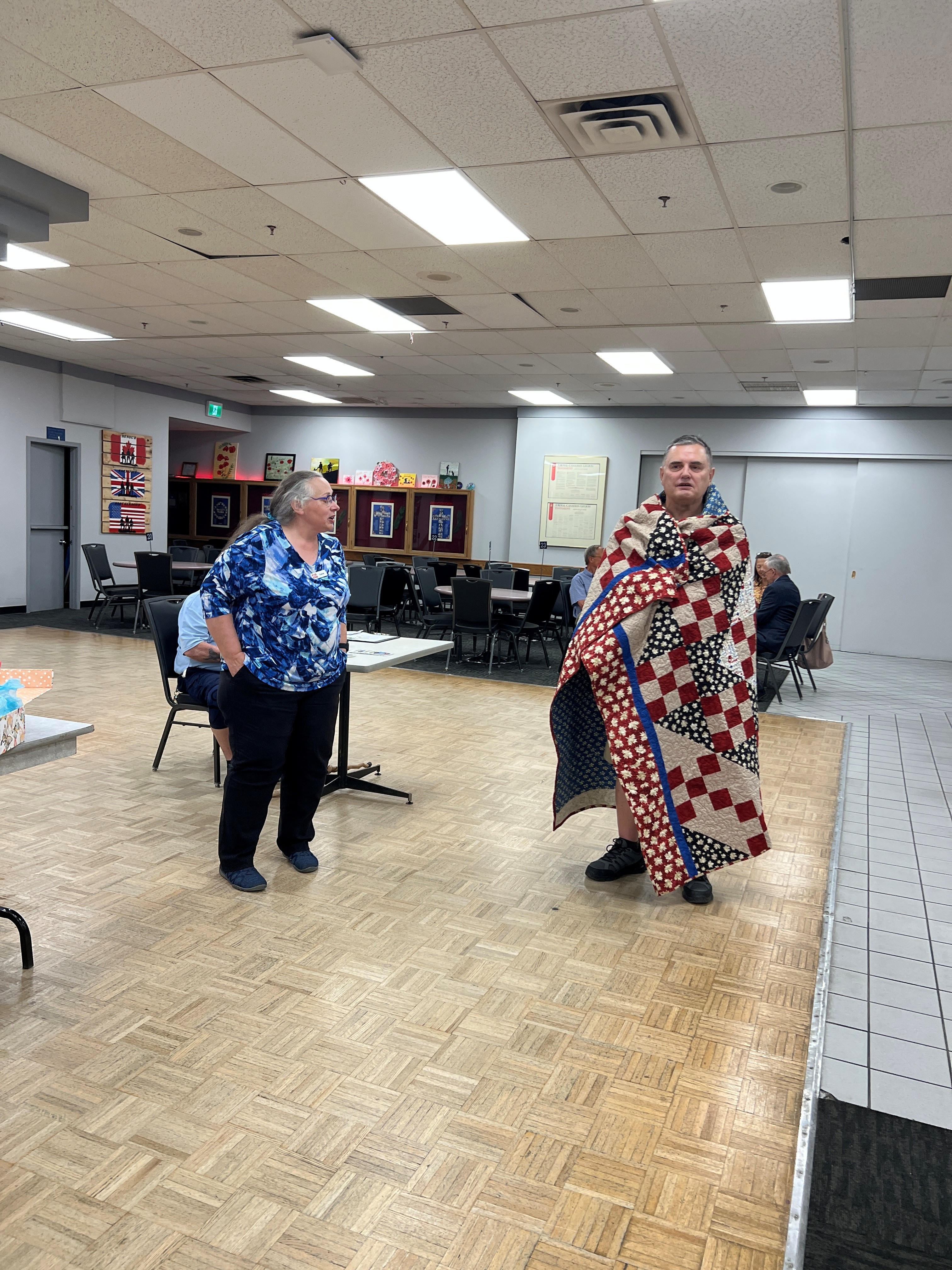 https://0901.nccdn.net/4_2/000/000/038/2d3/7-quilt-presentation-to-rick-kerton.jpg