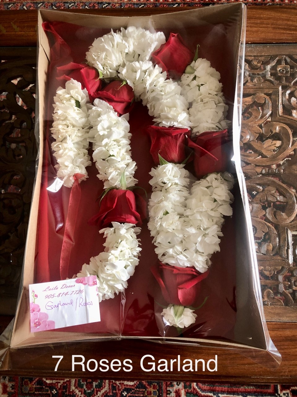 7 Roses garland in box $95 