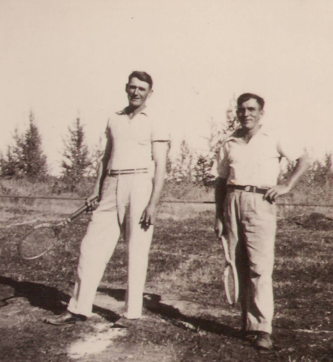 We know the gentleman on the left is Karl Haessel but are not sure who his tennis teammate is. Tennis was a popular sport amongst a few community members with Karl building a court (as seen in photo) and a court constructed at the Old Bay House. The two men also look very similar - leading us to believe they might be a father son team, but we are unsure of the fathers name! If you know any further information we would love to hear it!
990.4.42.6 / Hassel, Karl