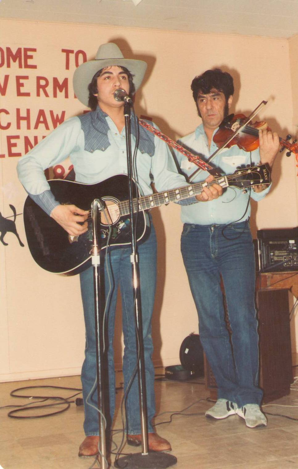 Does anyone recognize this duo from the 1983 "Hew Chaw Daze" Talent show?
998.1.60.172 / Newman, Jack and Pearl
--Edit--
Wayne Lambert is playing guitar and Howard Lizotte is playing fiddle!
