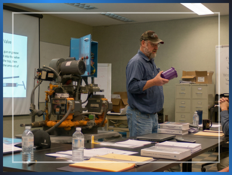 A man giving a lesson with a powerpoint