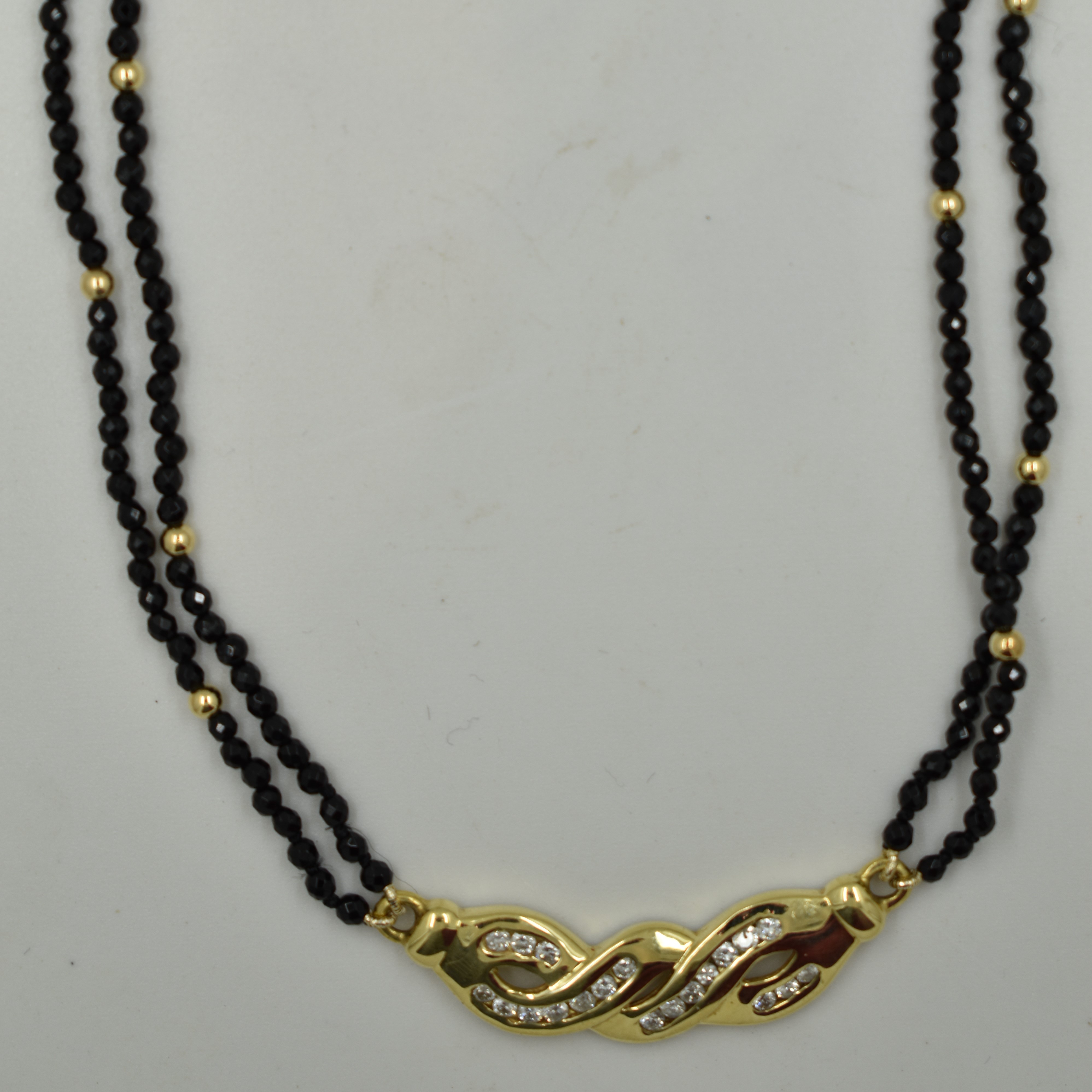 14K Yellow Gold
0.50ct with Onyx beads
Regular Price $4100
SALE $1250
Ref: NN215