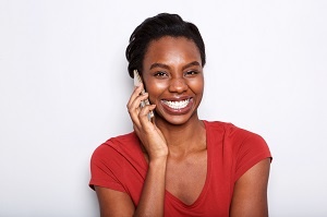 https://0901.nccdn.net/4_2/000/000/038/2d3/jci-younger-black-woman-on-phone-smiling-resized-300x199.jpg
