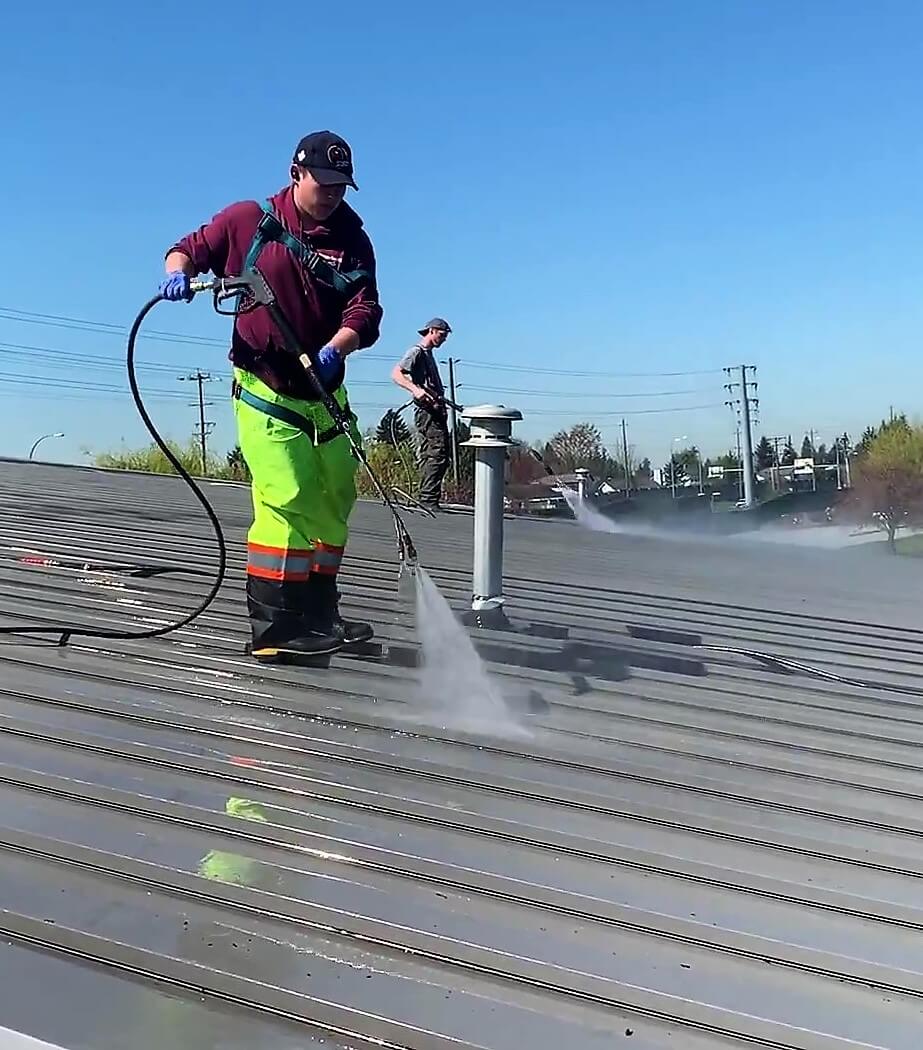 pressure washing metal roof at Meadow Gardens Golf Course